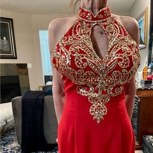 Red and gold sequined evening gown